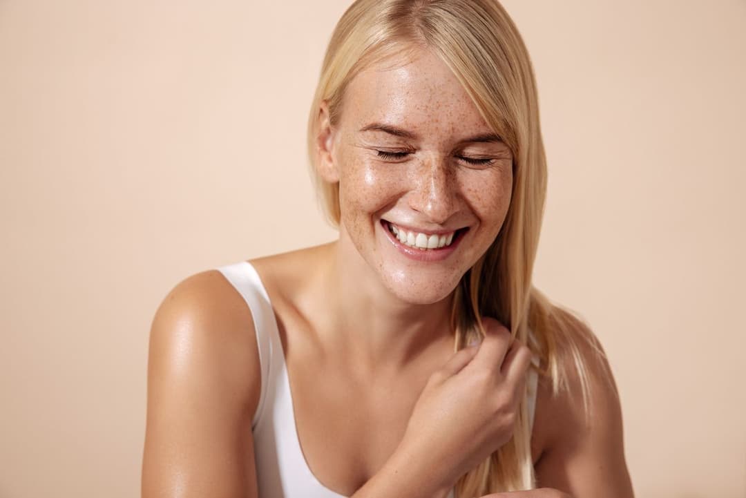 Woman smiling with clear skin