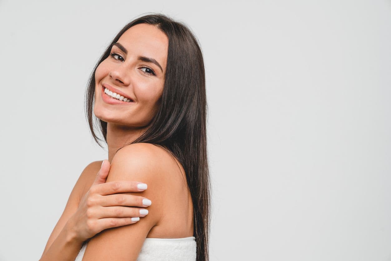 Woman glowing in her flawless skin