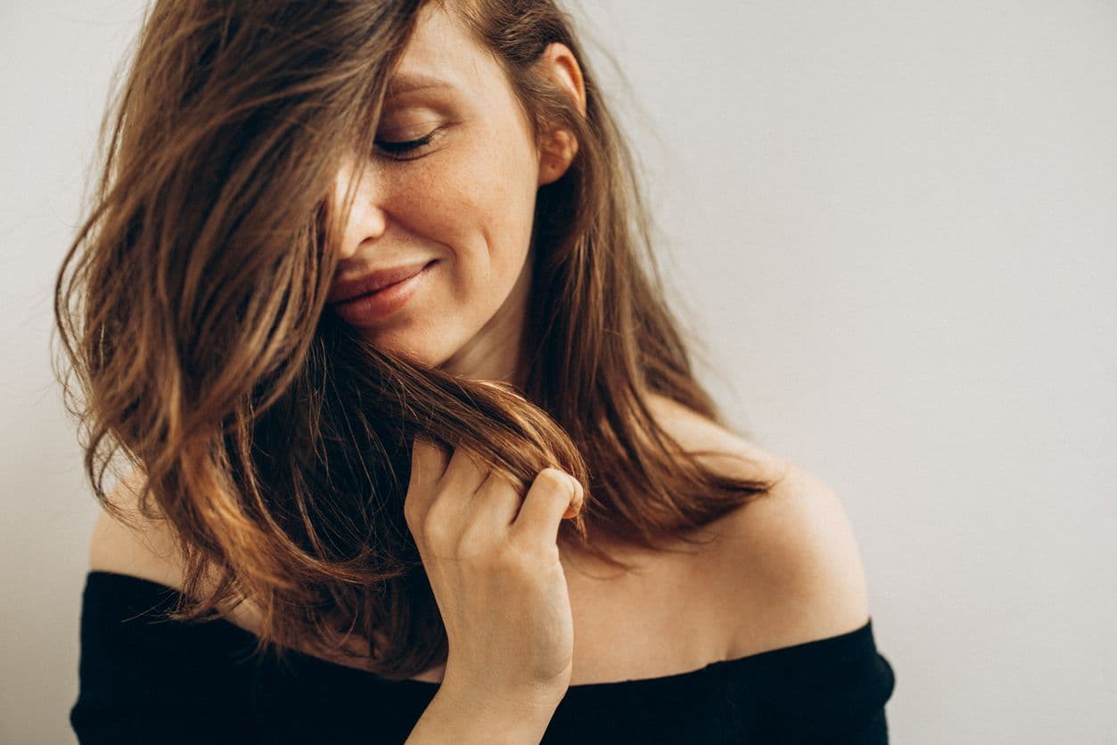 Woman loving her clear skin