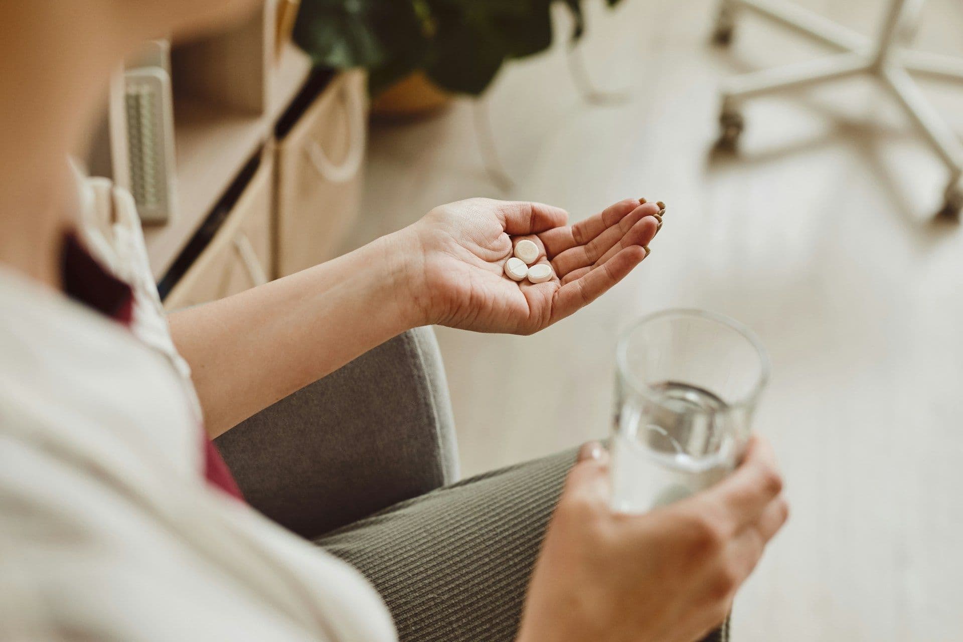 woman taking medication