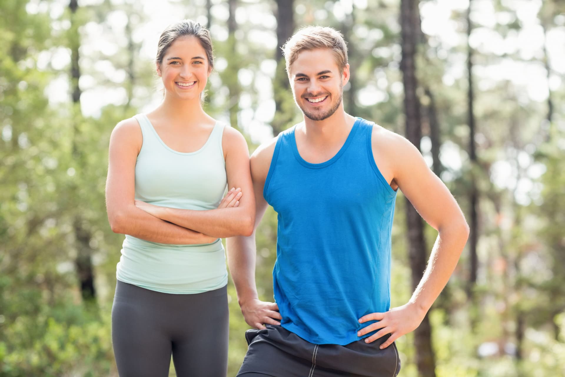Man and woman smiling and enjoying weight loss