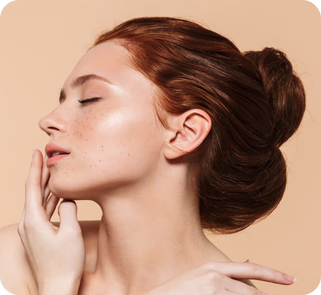 Woman's head turned to the side with serene expression